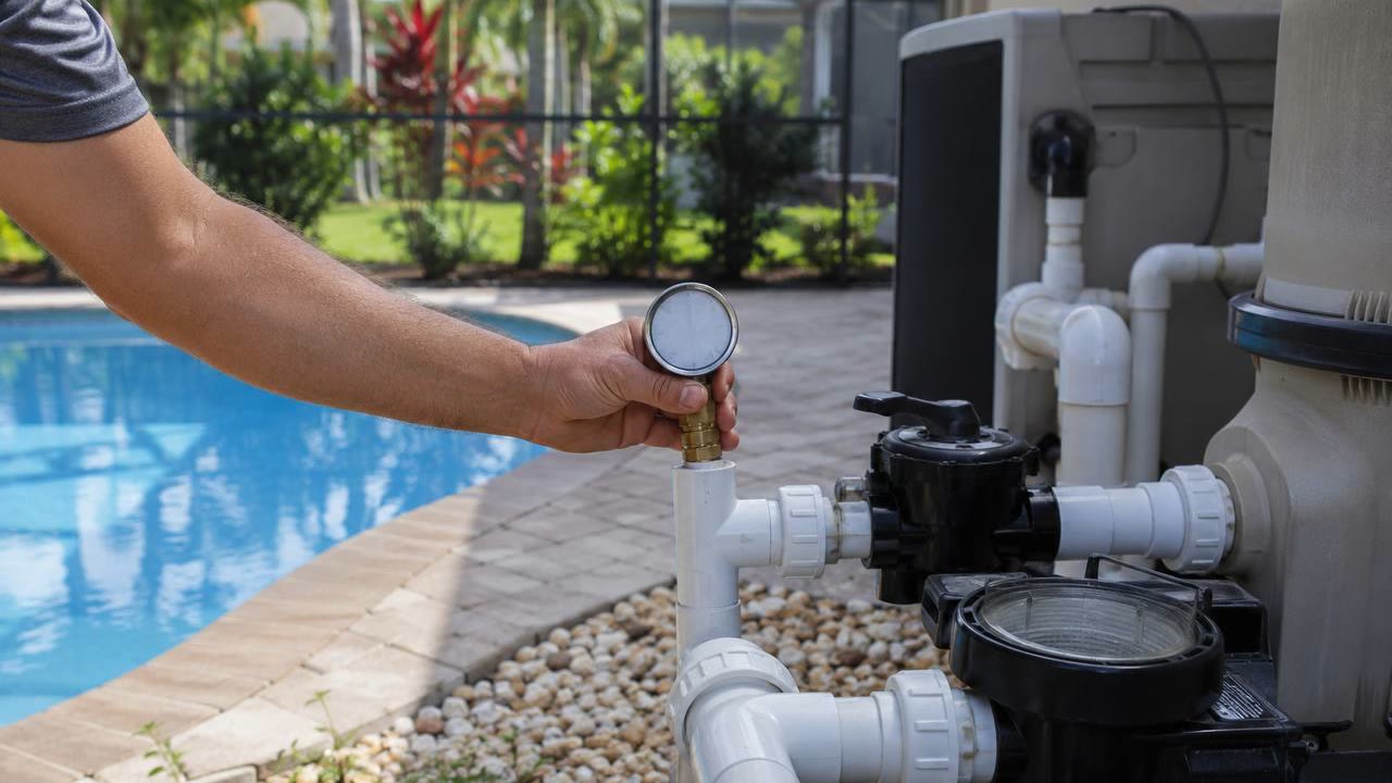 Pressure testing pool plumbing for a leak at an Orlando home